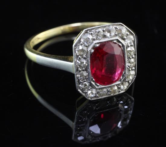 A 1920s/1930s 18ct gold and platinum, synthetic ruby and diamond cluster ring, size M.